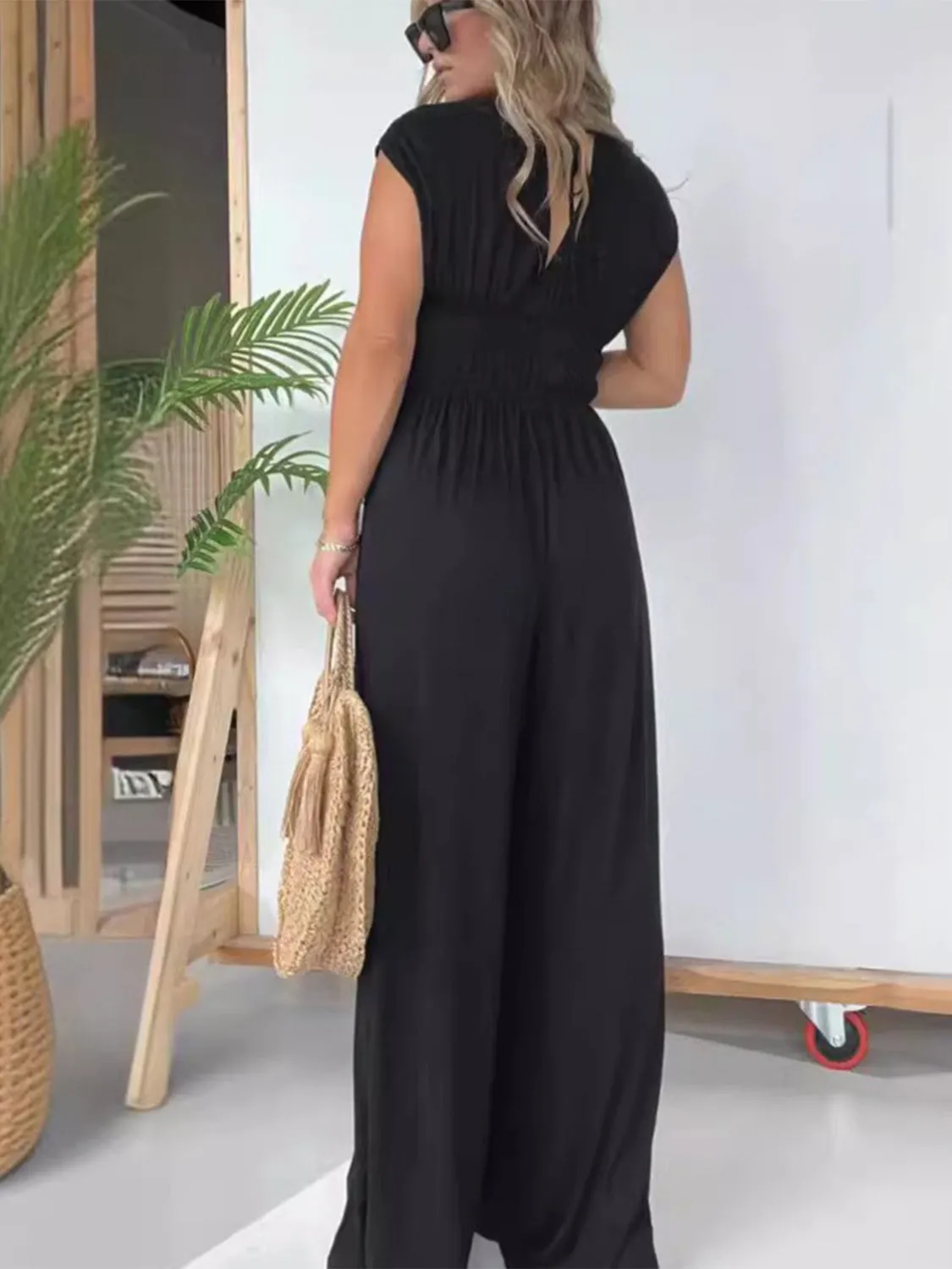 Smocked Cap Sleeve Wide Leg Jumpsuit sold by Charming Charlie product image thumbnail 2