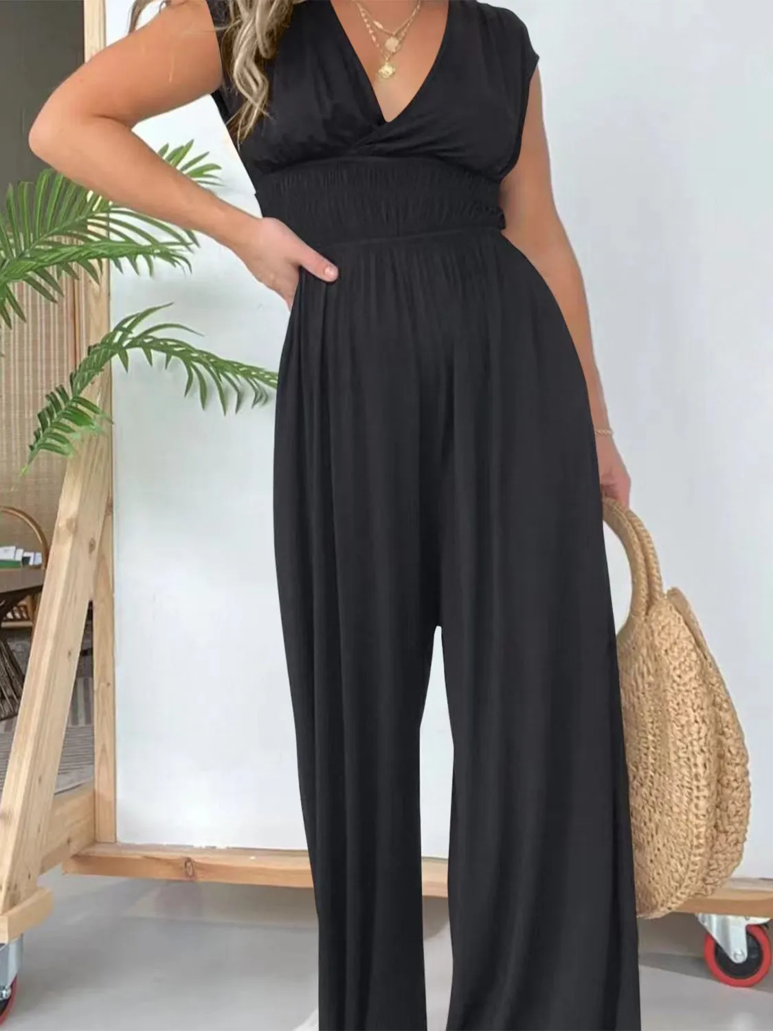Smocked Cap Sleeve Wide Leg Jumpsuit sold by Charming Charlie product image thumbnail 3