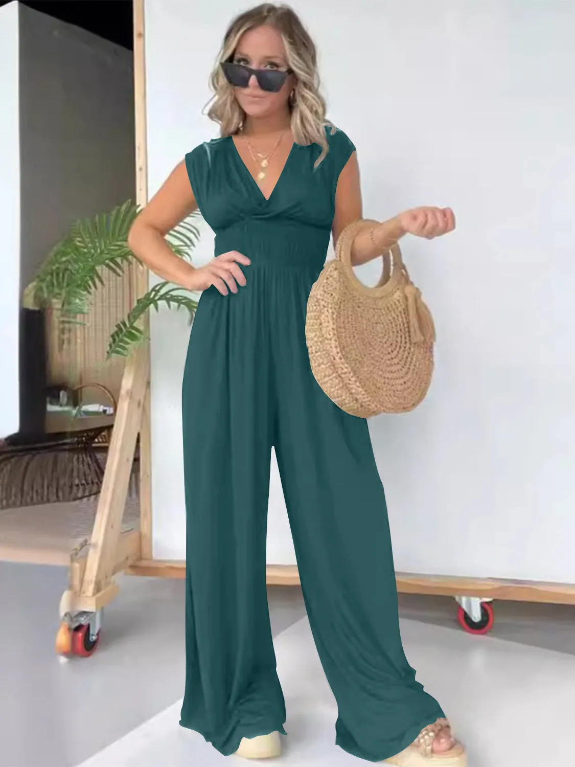 Smocked Cap Sleeve Wide Leg Jumpsuit sold by Charming Charlie product image thumbnail 4