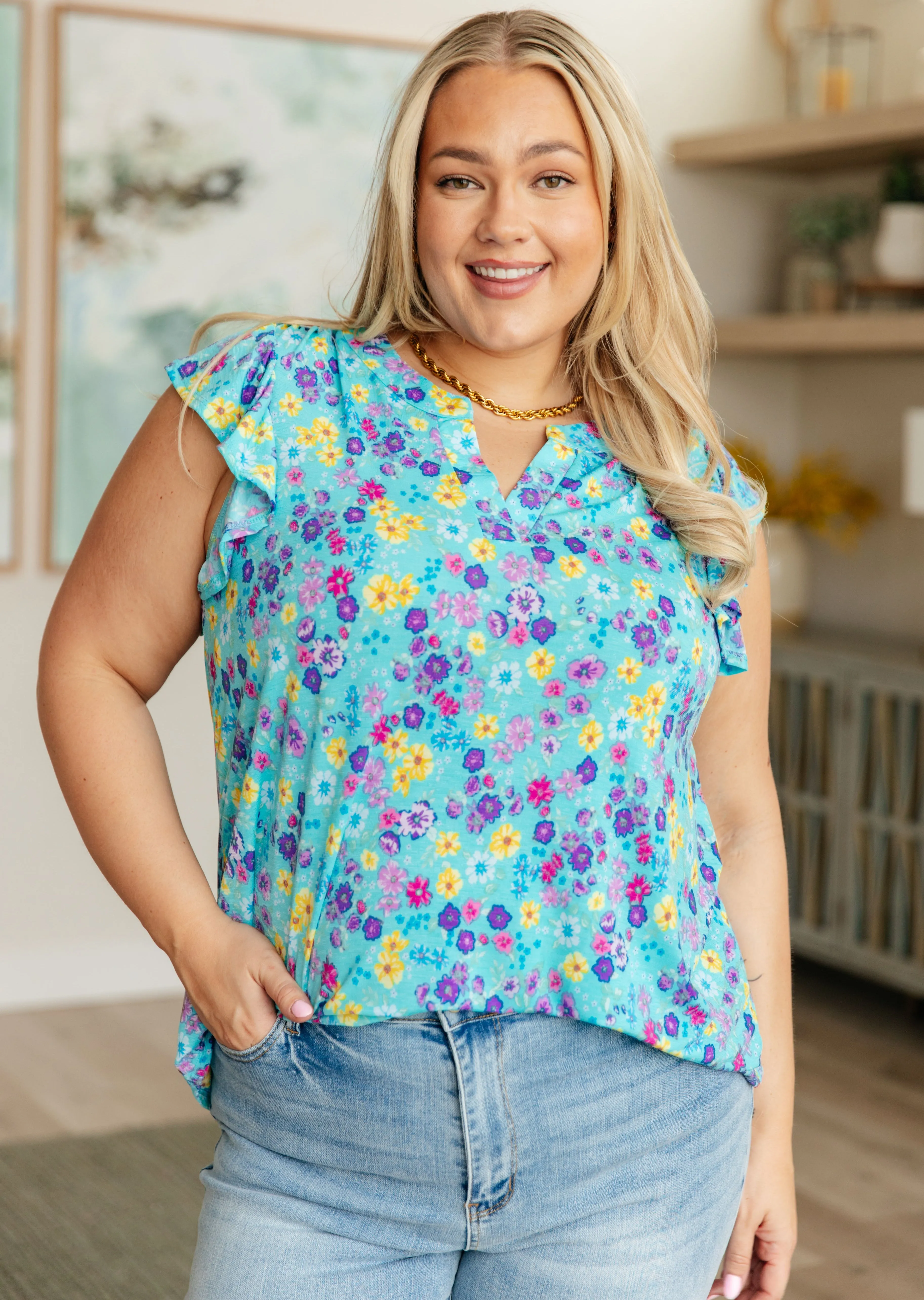 Lizzy Flutter Sleeve Top in Teal and Purple Floral sold by Charming Charlie product image thumbnail 2
