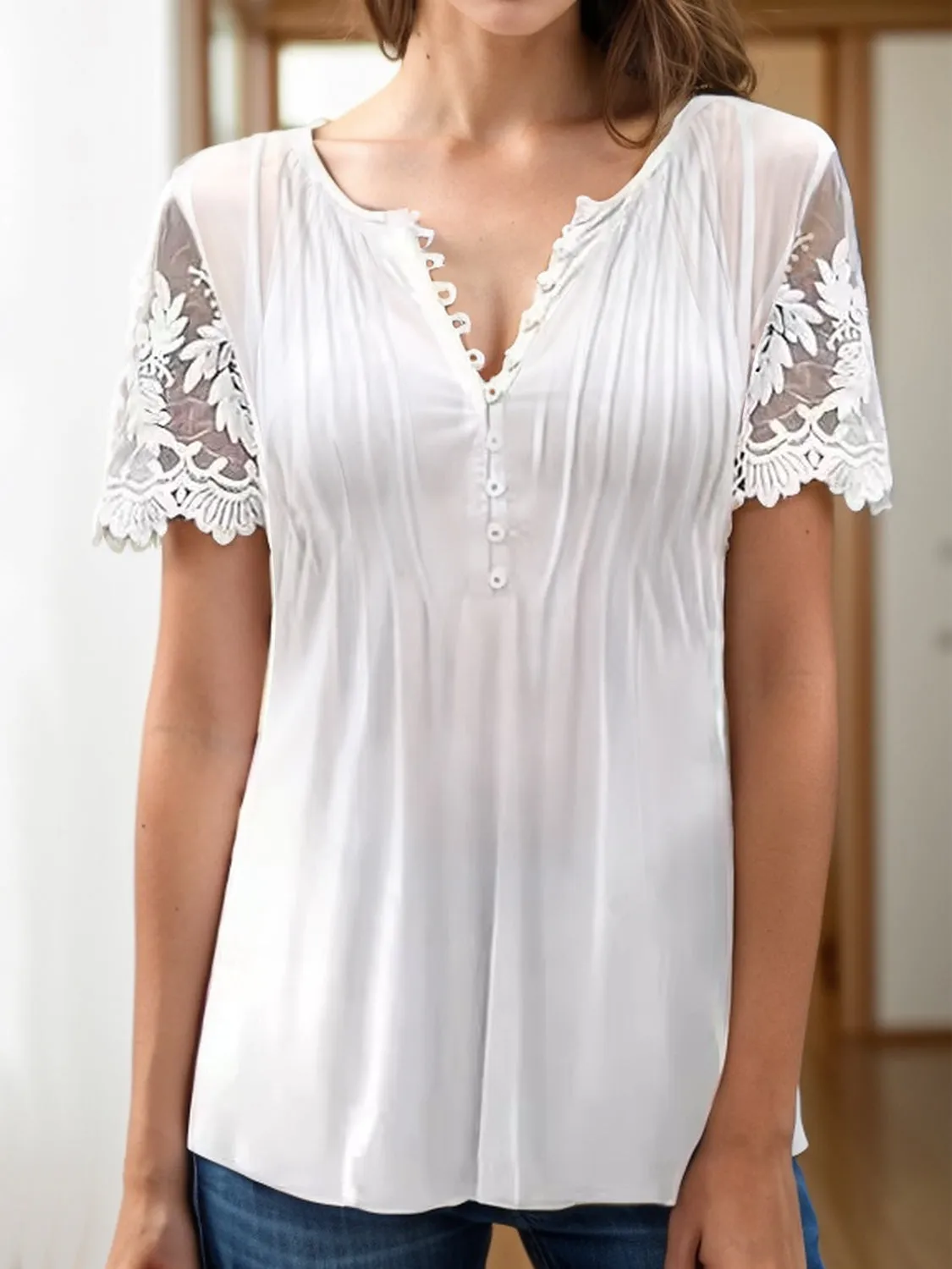 Notched Lace Short Sleeve Top sold by Charming Charlie