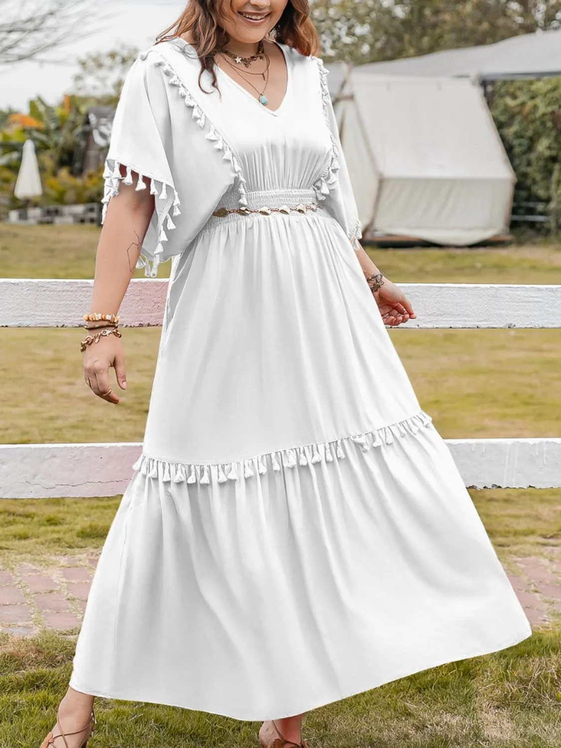 Plus Size Tassel Smocked V-Neck Half Sleeve Dress sold by Charming Charlie