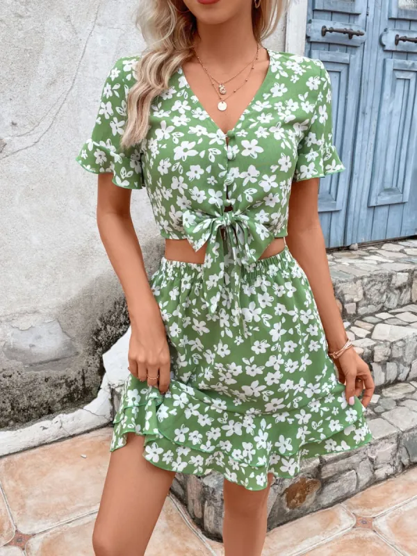 Tied Printed V-Neck Flounce Sleeve Mini Dress sold by Charming Charlie