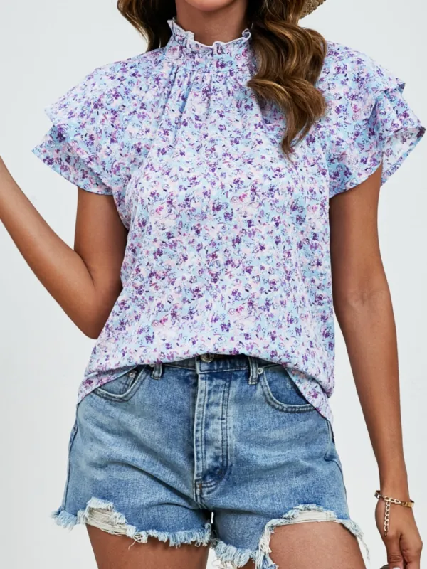 Ditsy Floral Mock Neck Flounce Sleeve Blouse sold by Charming Charlie