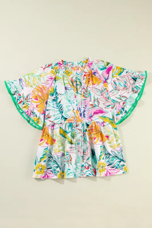 Ruffled Printed Tie Neck Blouse sold by Charming Charlie