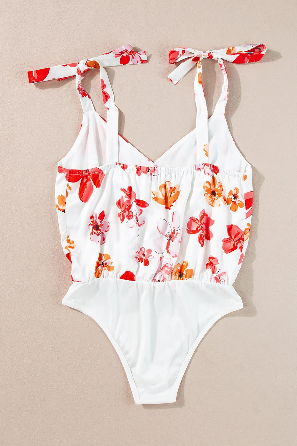 Tied Printed Surplice Sleeveless Bodysuit sold by Charming Charlie product image thumbnail 3