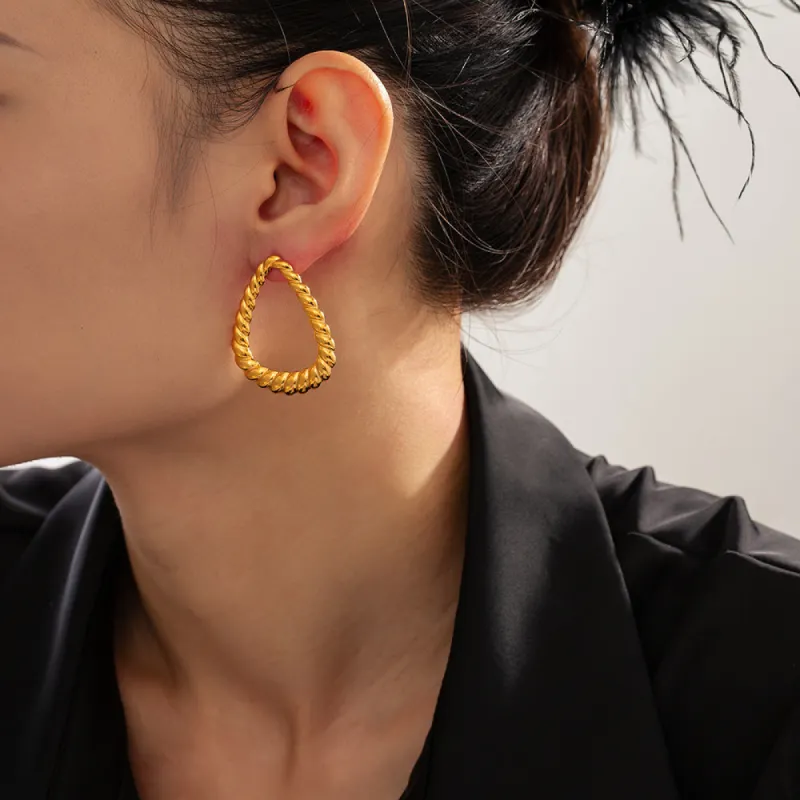 18K Gold-Plated Twisted Earrings sold by Charming Charlie
