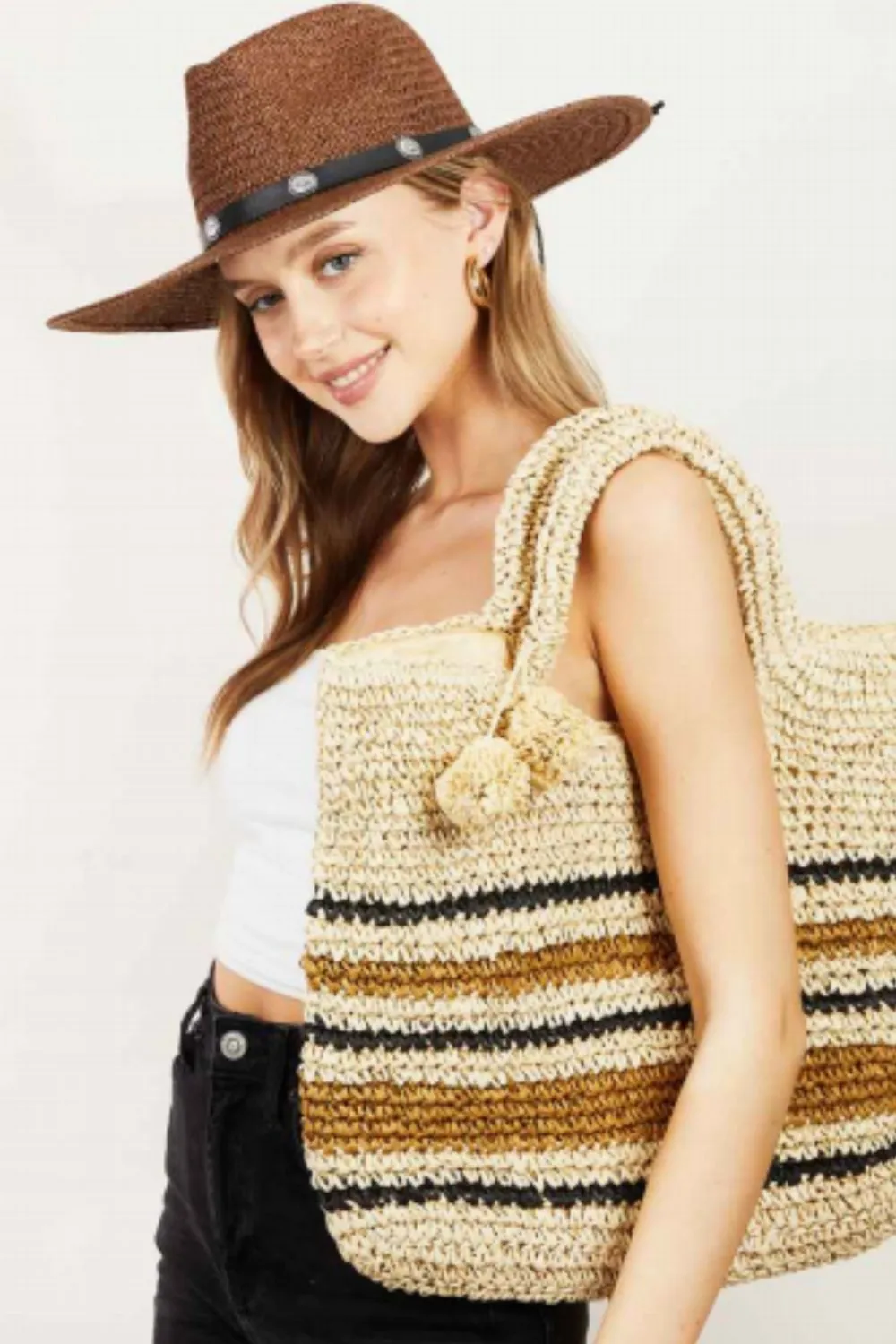 Fame Striped Straw Braided Tote Bag sold by Charming Charlie