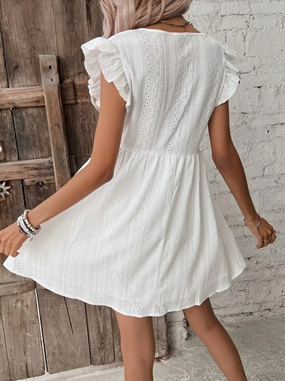 Eyelet Ruffled Cap Sleeve Mini Dress sold by Charming Charlie product image thumbnail 2