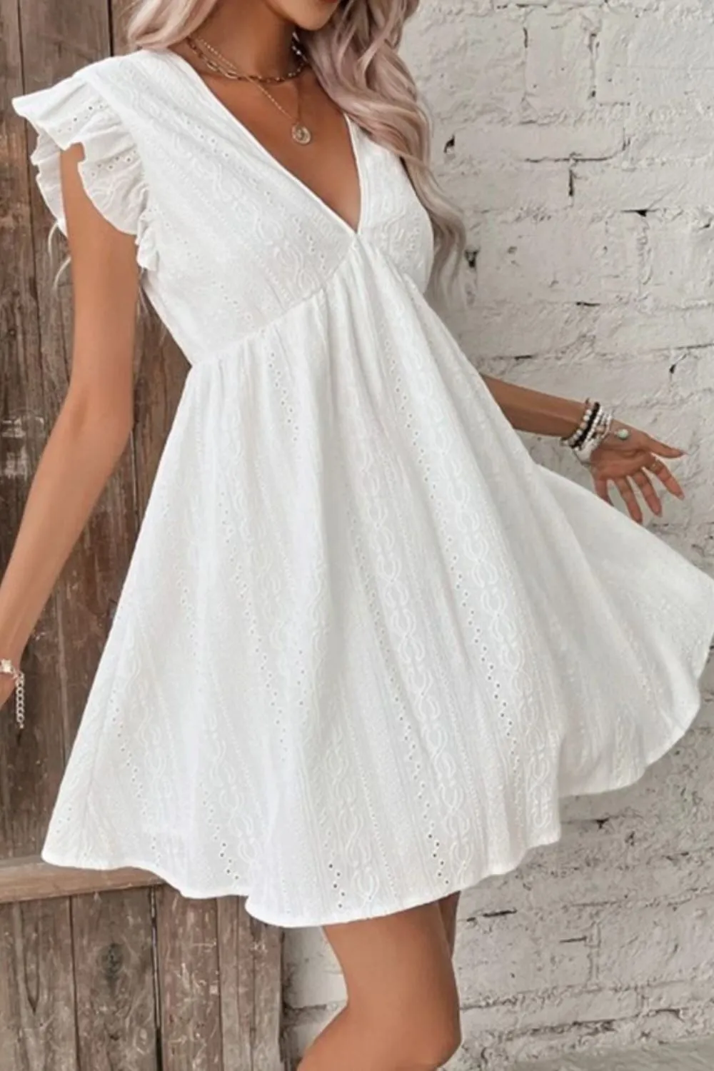 Eyelet Ruffled Cap Sleeve Mini Dress sold by Charming Charlie product image thumbnail 3