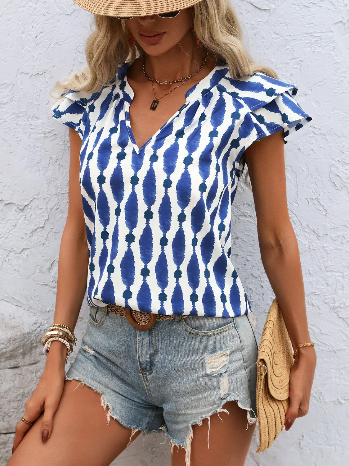 Ruffled Printed Notched Cap Sleeve Blouse sold by Charming Charlie product image thumbnail 4