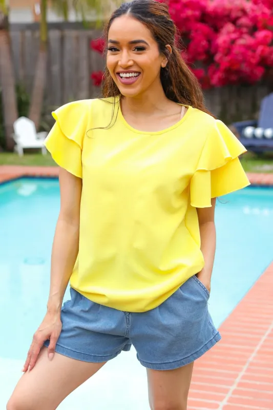Lovely In Yellow Tiered Double Ruffle Sleeve Woven Top sold by Charming Charlie