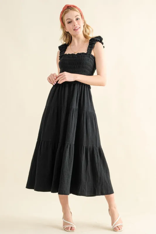 And The Why Smocked Ruffled Tiered Dress sold by Charming Charlie
