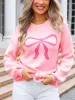 Bow Graphic Round Neck Long Sleeve Sweater sold by Charming Charlie