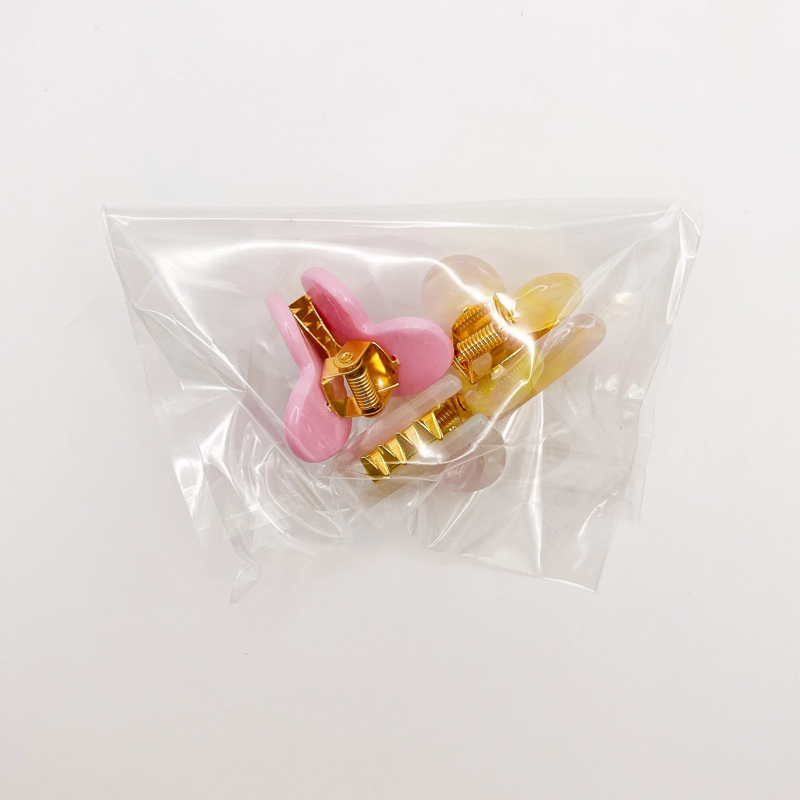 Mini Clip Trio - Heart: Pink Lemonade / Pink + Pearl White / Bubblegum sold by Charming Charlie product image thumbnail 2