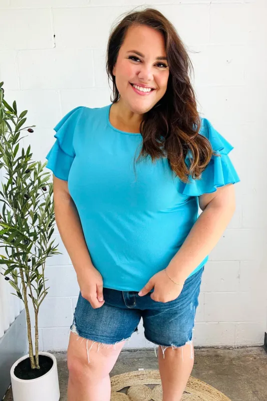Lovely In Blue Tiered Double Ruffle Sleeve Woven Top sold by Charming Charlie