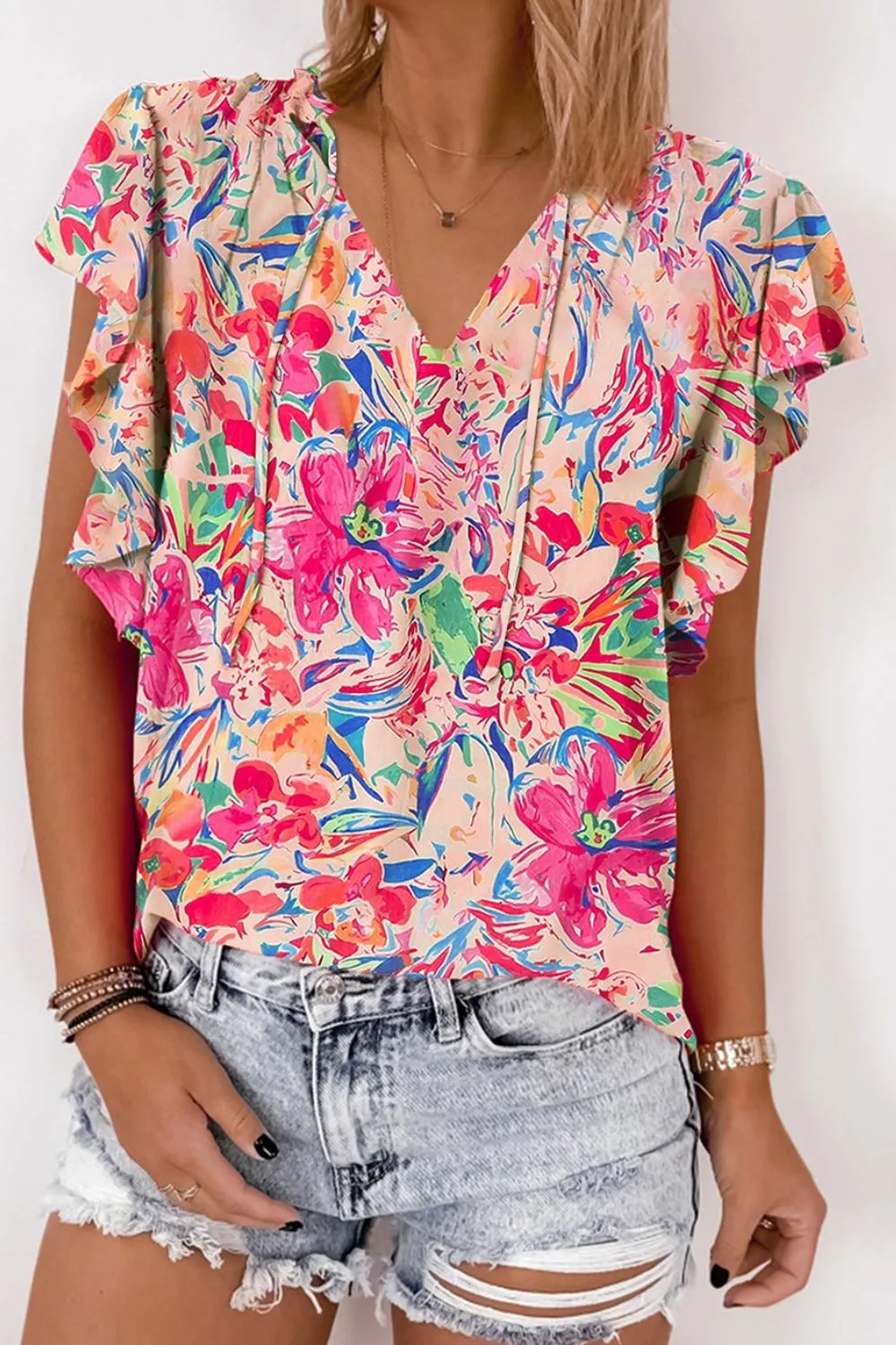 Ruffled Printed Tie Neck Cap Sleeve Blouse sold by Charming Charlie