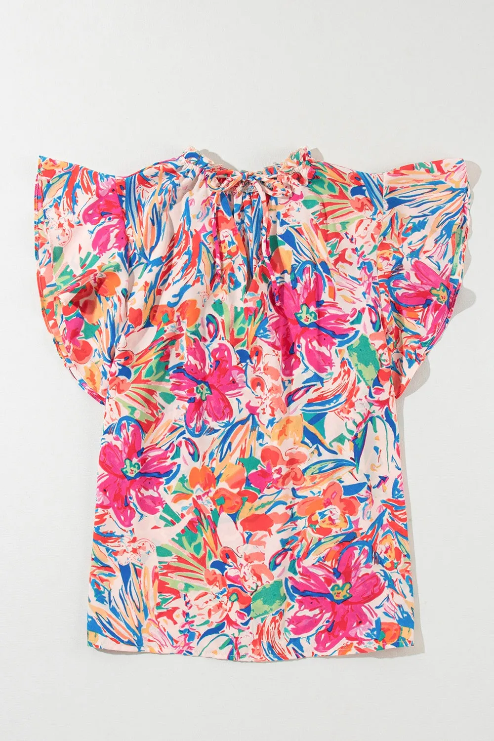 Ruffled Printed Tie Neck Cap Sleeve Blouse sold by Charming Charlie product image thumbnail 2