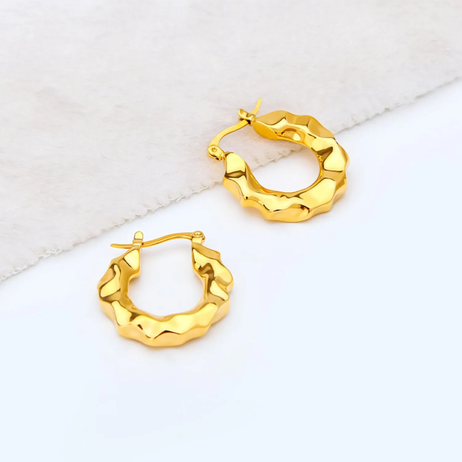 Gold-Plated Huggie Earrings sold by Charming Charlie product image thumbnail 4