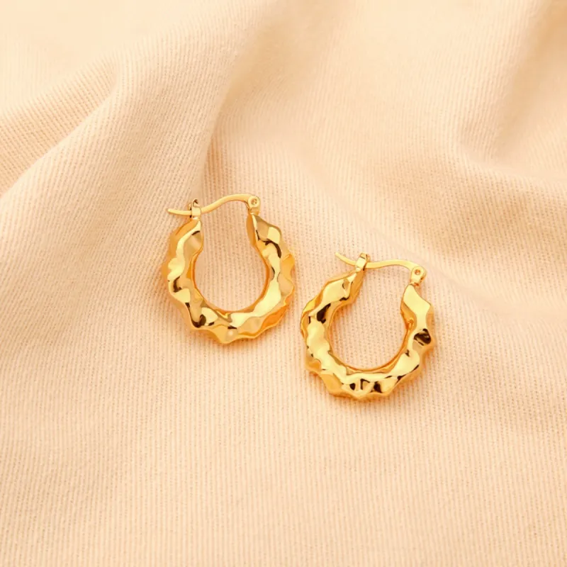 Gold-Plated Huggie Earrings sold by Charming Charlie