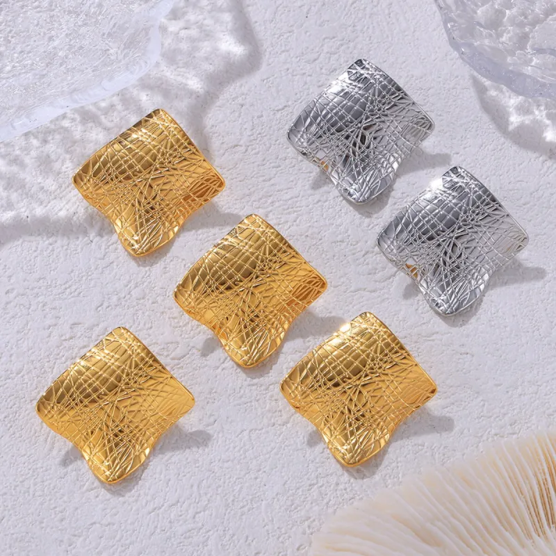 Textured Titanium Steel Stud Earrings sold by Charming Charlie
