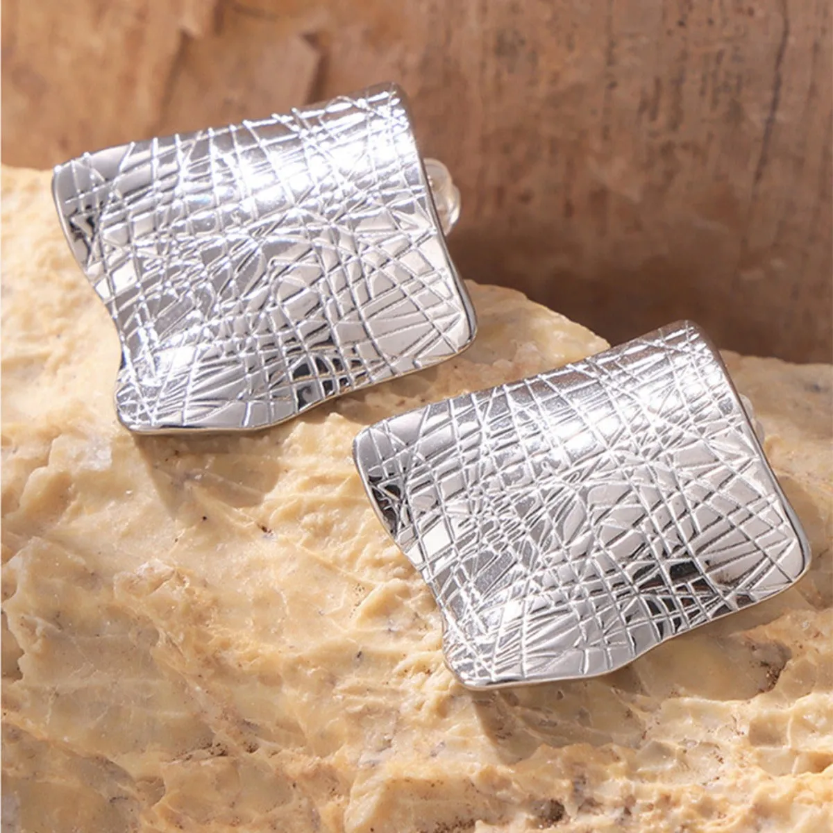 Textured Titanium Steel Stud Earrings sold by Charming Charlie product image thumbnail 5