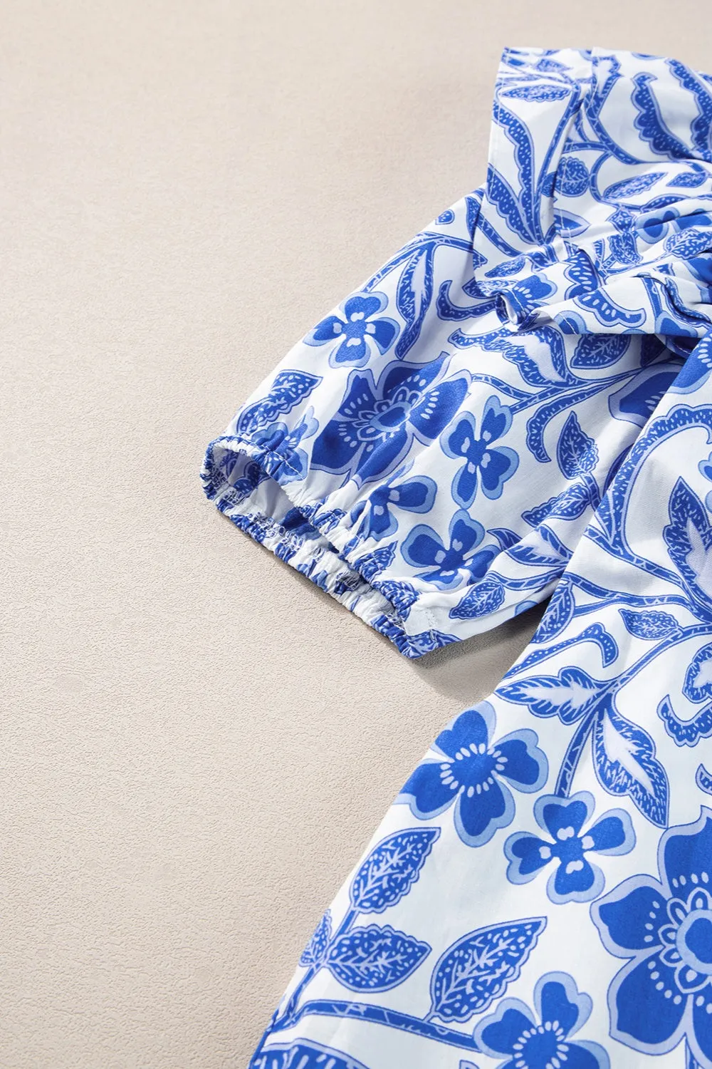 Printed Notched Half Sleeve Blouse sold by Charming Charlie product image thumbnail 5