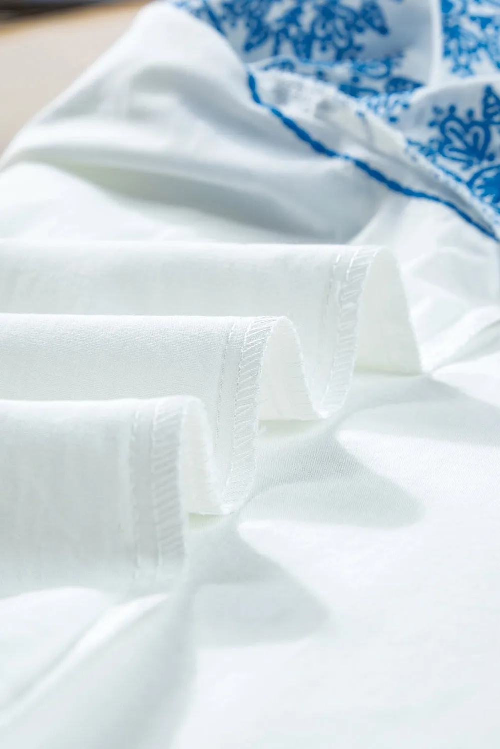 Ruffled Mock Neck Cap Sleeve Blouse sold by Charming Charlie product image thumbnail 4