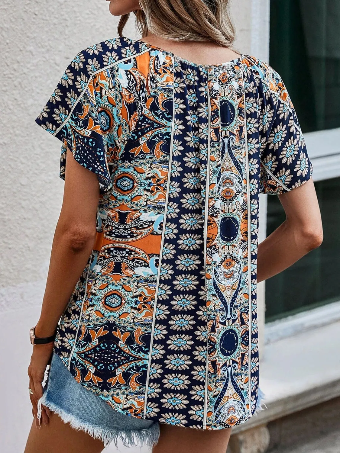 Printed Tie Neck Short Sleeve Blouse sold by Charming Charlie product image thumbnail 4
