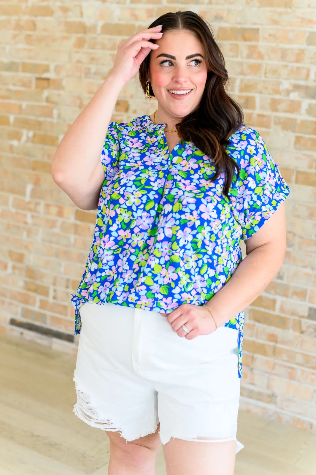 Lizzy Cap Sleeve Top in Royal and Pink Wildflower sold by Charming Charlie