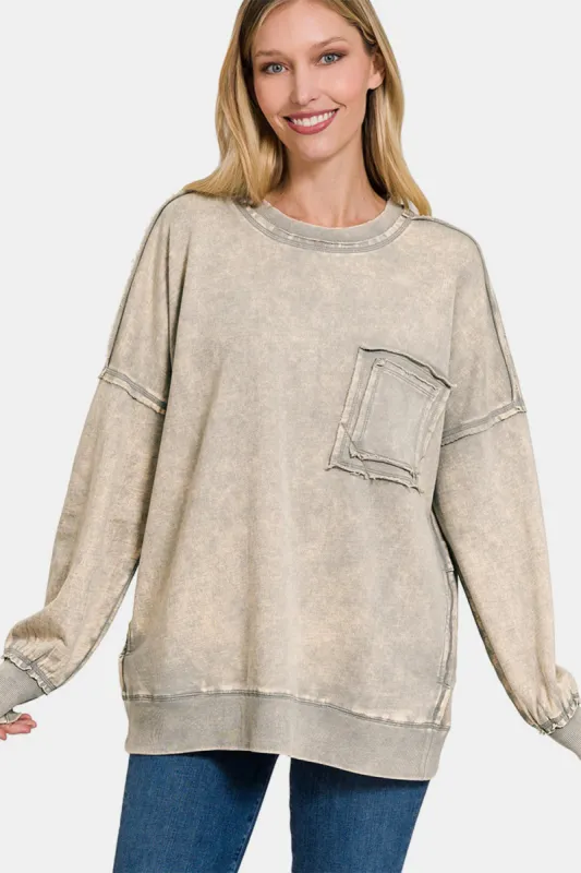 Zenana Exposed Seam Round Neck Dropped Shoulder Sweatshirt sold by Charming Charlie