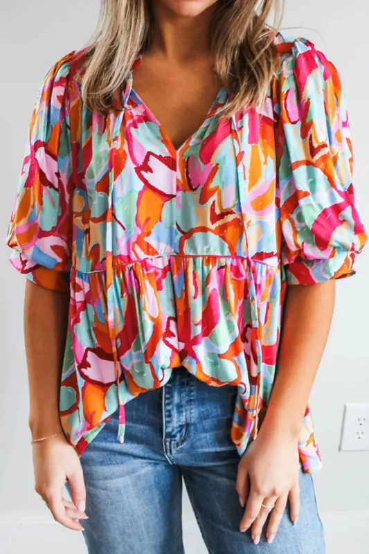 Printed Tie Neck Half Sleeve Blouse sold by Charming Charlie