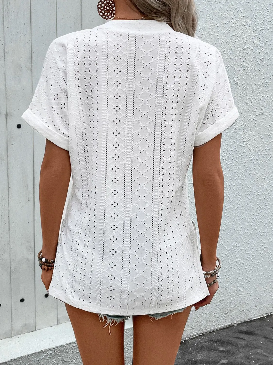 Eyelet Notched Short Sleeve Blouse sold by Charming Charlie product image thumbnail 2