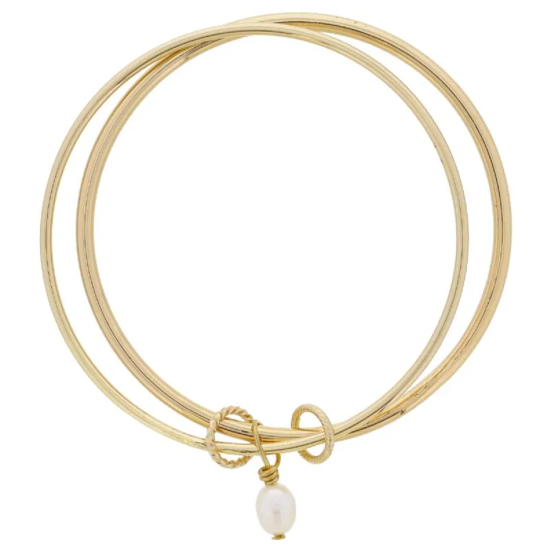 Gold Textured Rings and Pearl Dangle on Smooth Gold Bangles Bracelet, 9" Around sold by Charming Charlie