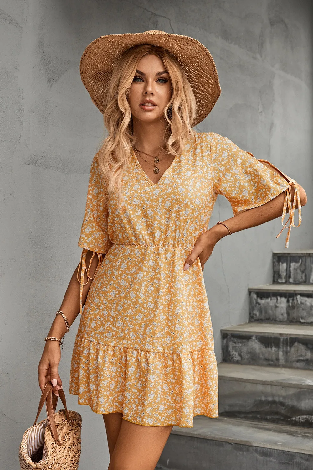 Ditsy Floral V-Neck Half Sleeve Mini Dress sold by Charming Charlie