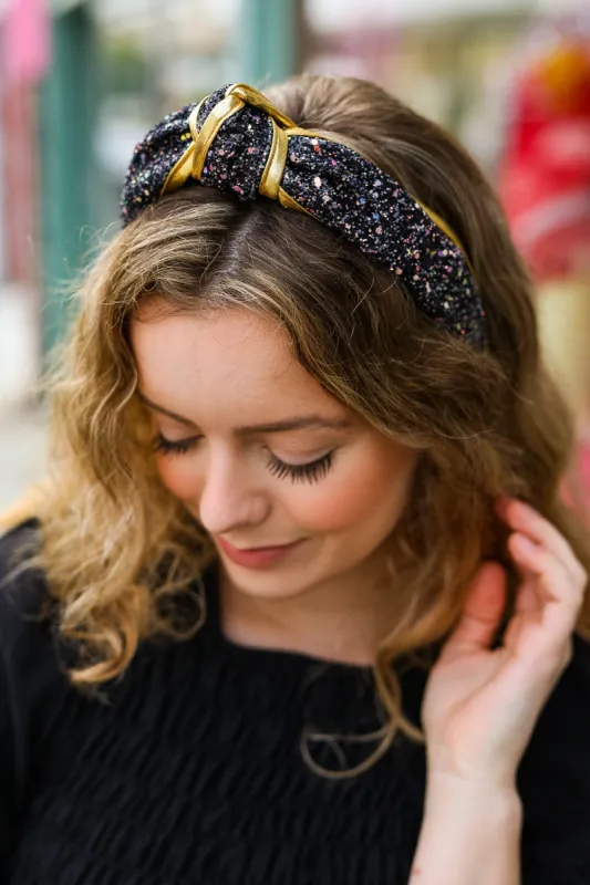 Black & Gold Glitter Top Knot Headband sold by Charming Charlie