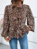 Peplum Tied Long Sleeve Blouse sold by Charming Charlie