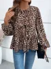 Peplum Tied Long Sleeve Blouse sold by Charming Charlie