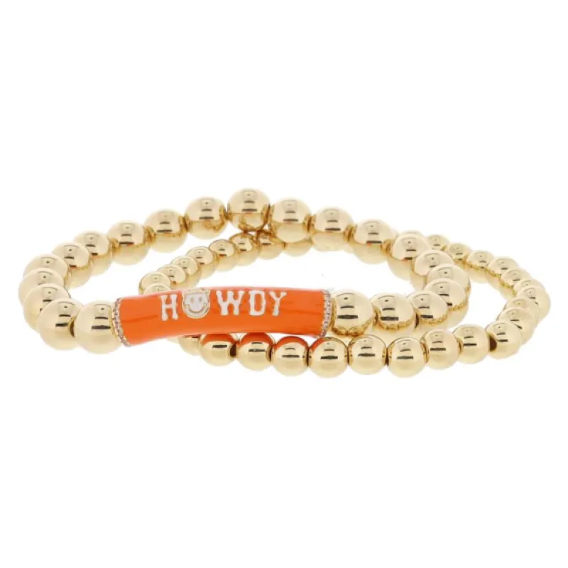 Set of 2, Gold Ball, Orange & White "HOWDY" Bar with Crystal on Large Gold Ball Bracelet, 8" Around sold by Charming Charlie