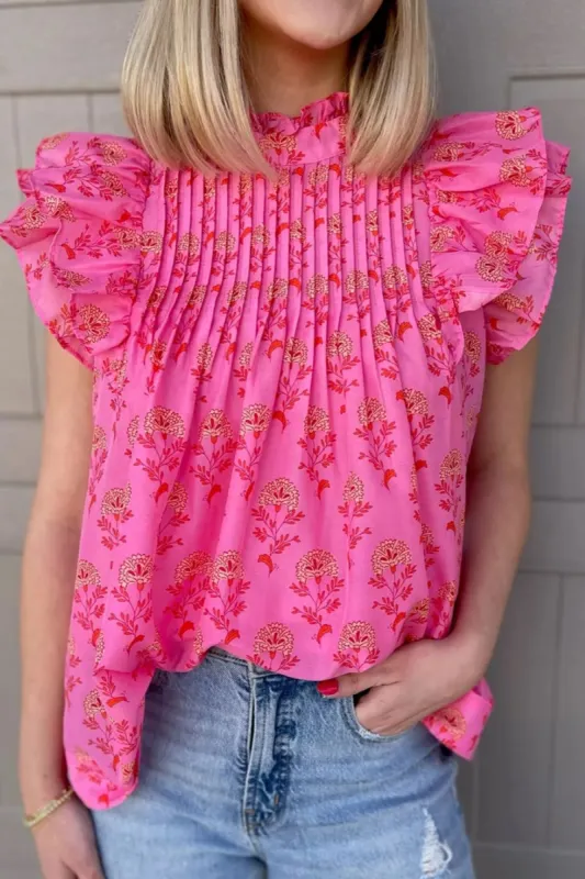 Ruffled Printed Mock Neck Cap Sleeve Blouse sold by Charming Charlie