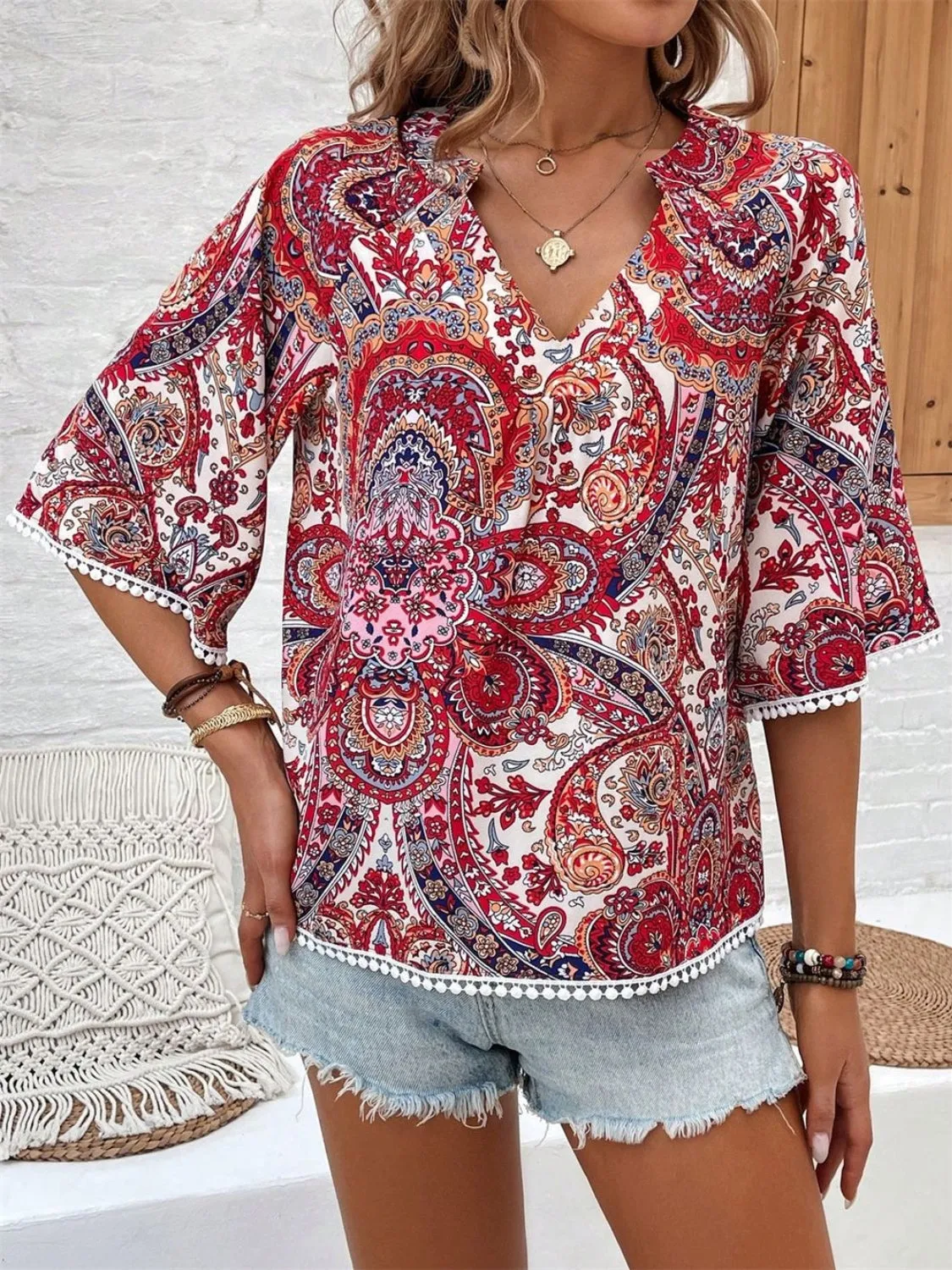 Printed Notched Half Sleeve Blouse sold by Charming Charlie product image thumbnail 3