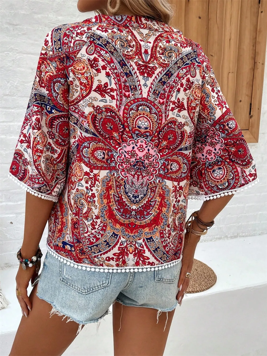 Printed Notched Half Sleeve Blouse sold by Charming Charlie product image thumbnail 4