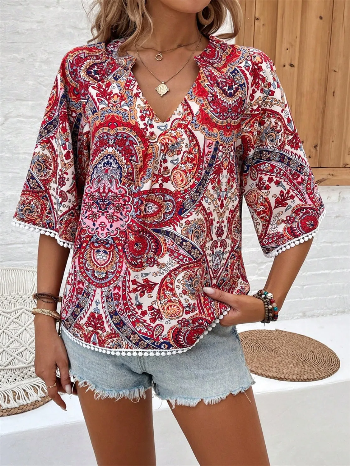 Printed Notched Half Sleeve Blouse sold by Charming Charlie product image thumbnail 5