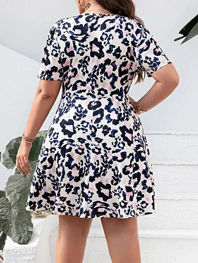 Plus Size Leopard Surplice Mini Dress sold by Charming Charlie product image thumbnail 5