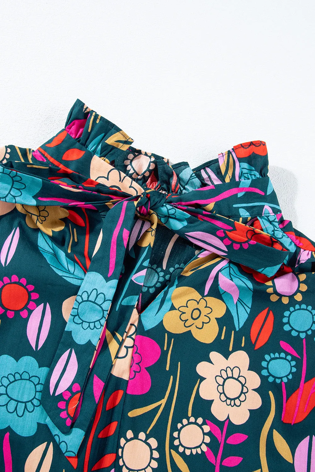 Printed Tie Neck Half Sleeve Blouse sold by Charming Charlie product image thumbnail 4