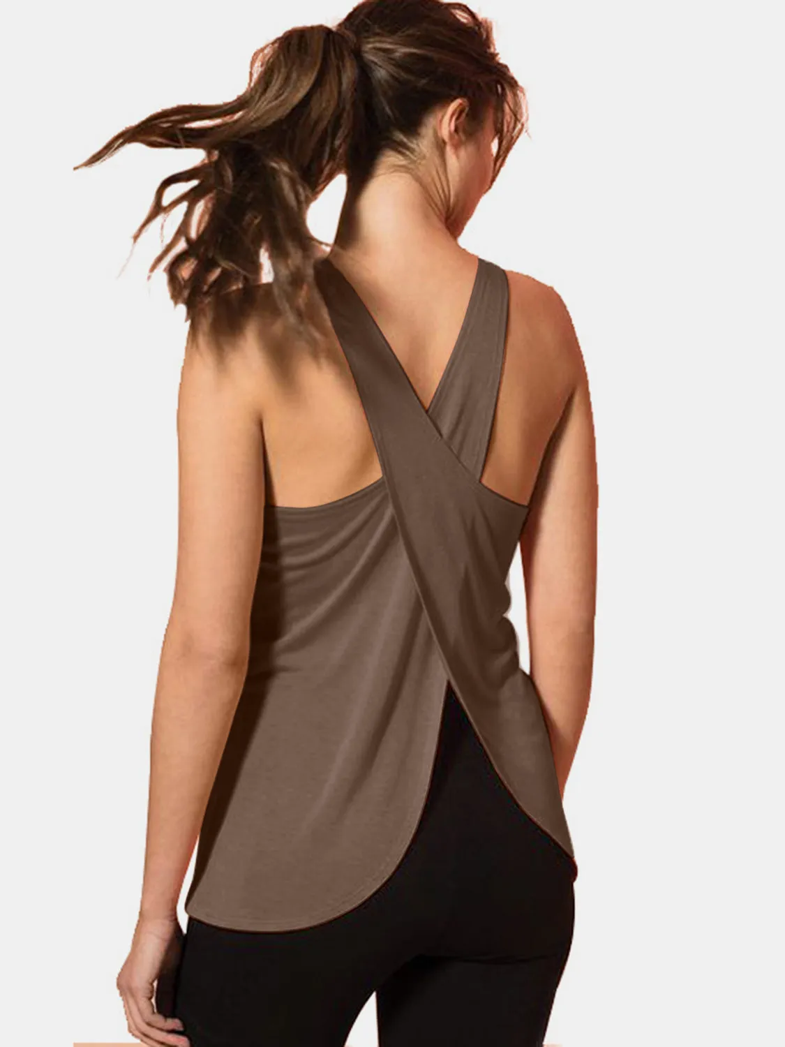 Crisscross Scoop Neck Active Tank sold by Charming Charlie