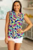 Lizzy Flutter Sleeve Top in Royal and Magenta Mod Floral sold by Charming Charlie