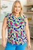 Lizzy Flutter Sleeve Top in Royal and Magenta Mod Floral sold by Charming Charlie