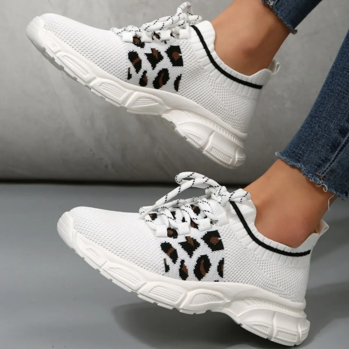 Tied Leopard Round Toe Sneakers sold by Charming Charlie