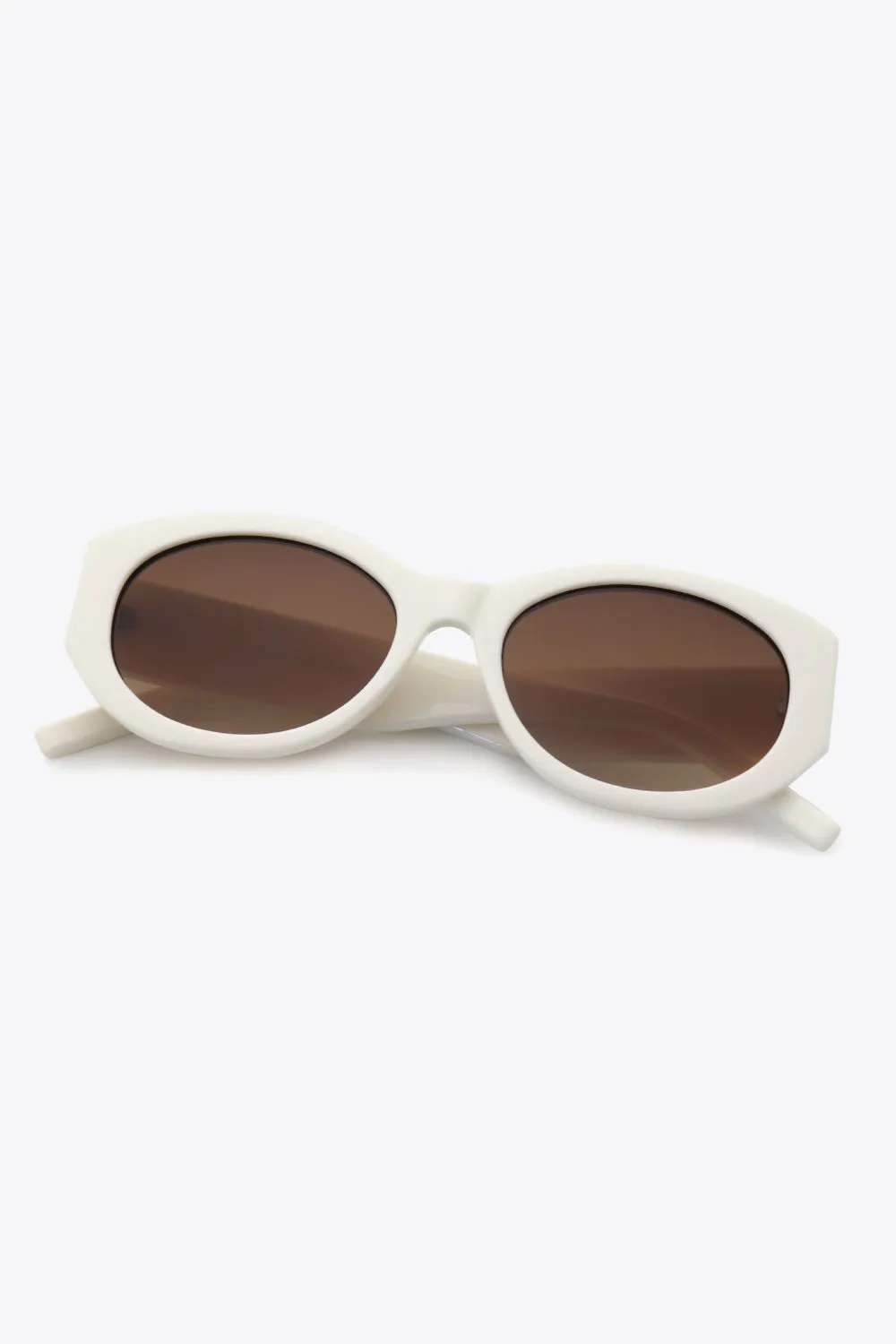 UV400 Polycarbonate Sunglasses sold by Charming Charlie